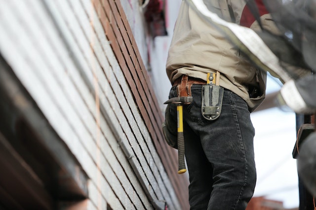 man doing home maintenance